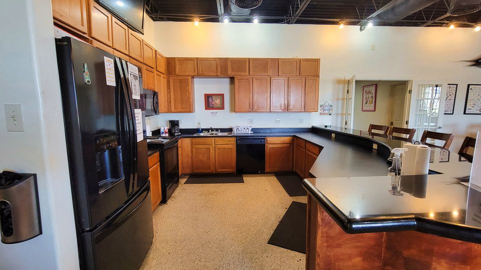 The professional kitchen and serving bar in the clubhouse