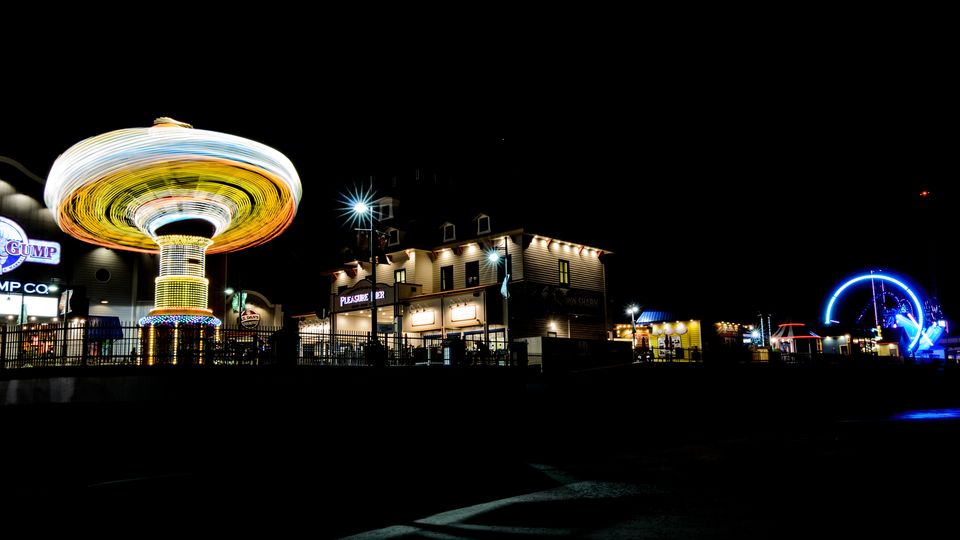 The Galveston Island Historic Pleasure Pier lit up at night