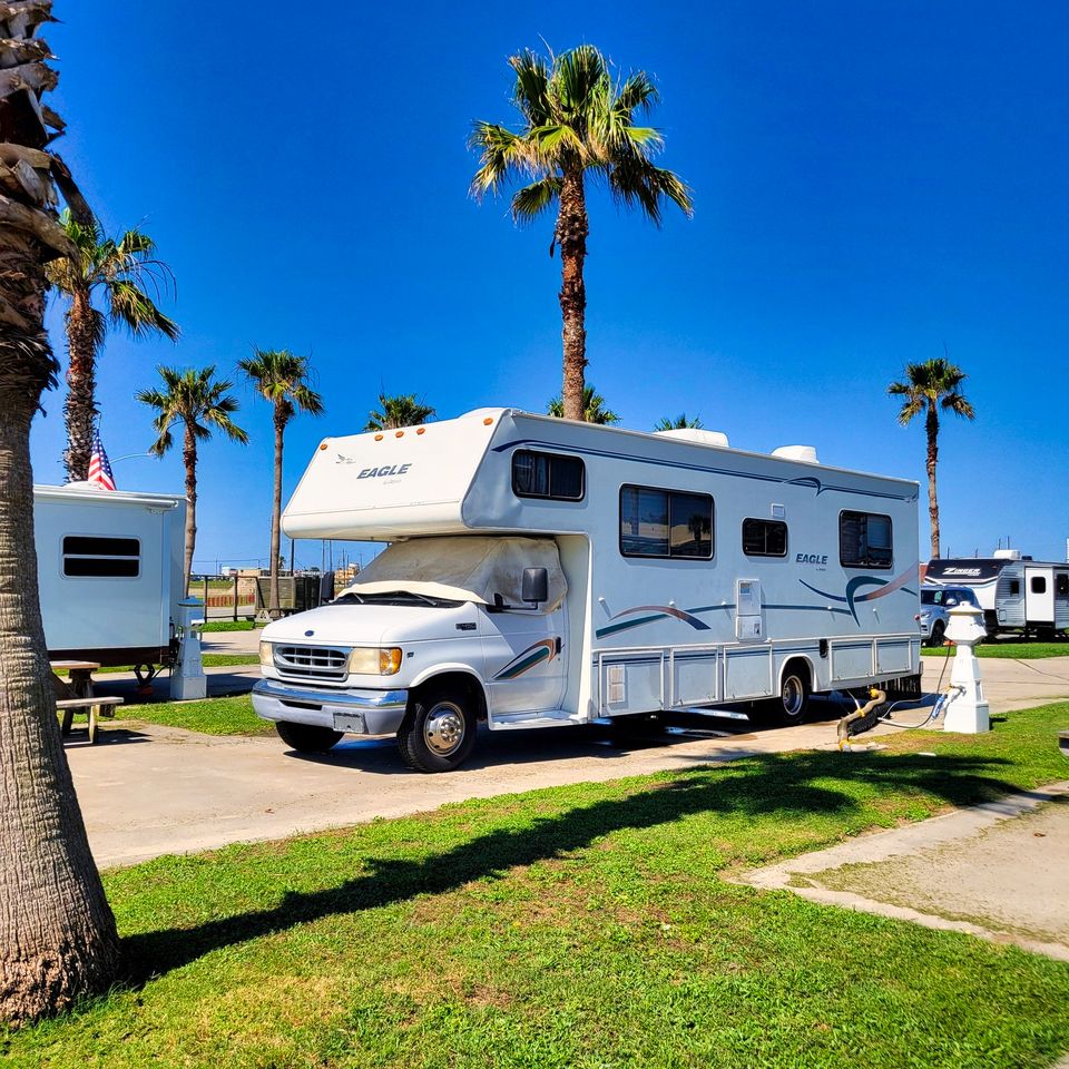 A pull-through site at Sandpiper RV Resort